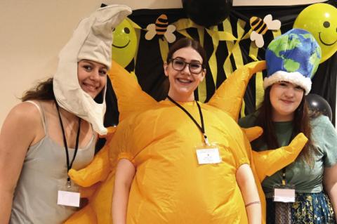 THE GREAT 2024 ECLIPSERS won the prize for the best costume at the Grate Spelling Bee on April 6. Team members pictured, moon, sun and Earth: Shauna Elliott, Shelby Elliott, and Bailey Johnson.