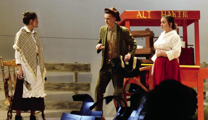 Jocelyn Dennis played Aunt Eller (left), Michael Weeks played the peddler Ali Hakim, and Karli Mack Phillips played the flirtatious Ado Annie in Altus High School’s production of Oklahoma! on Nov. 16 and 17. Photos by Kathleen Guill | Altus Times