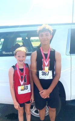 The Navajo Cross-Country team recently participated in a meet in Duncan. Morgan Buss (left) placed 20th out of 80 girls, and Kayden Carter (right) placed 13th out of 62 boys. Congratulations to all the participants! Courtesy photo