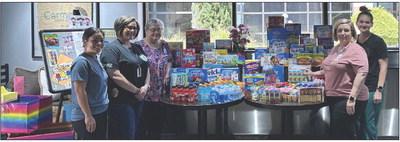 JCMH employees conduct snack drive